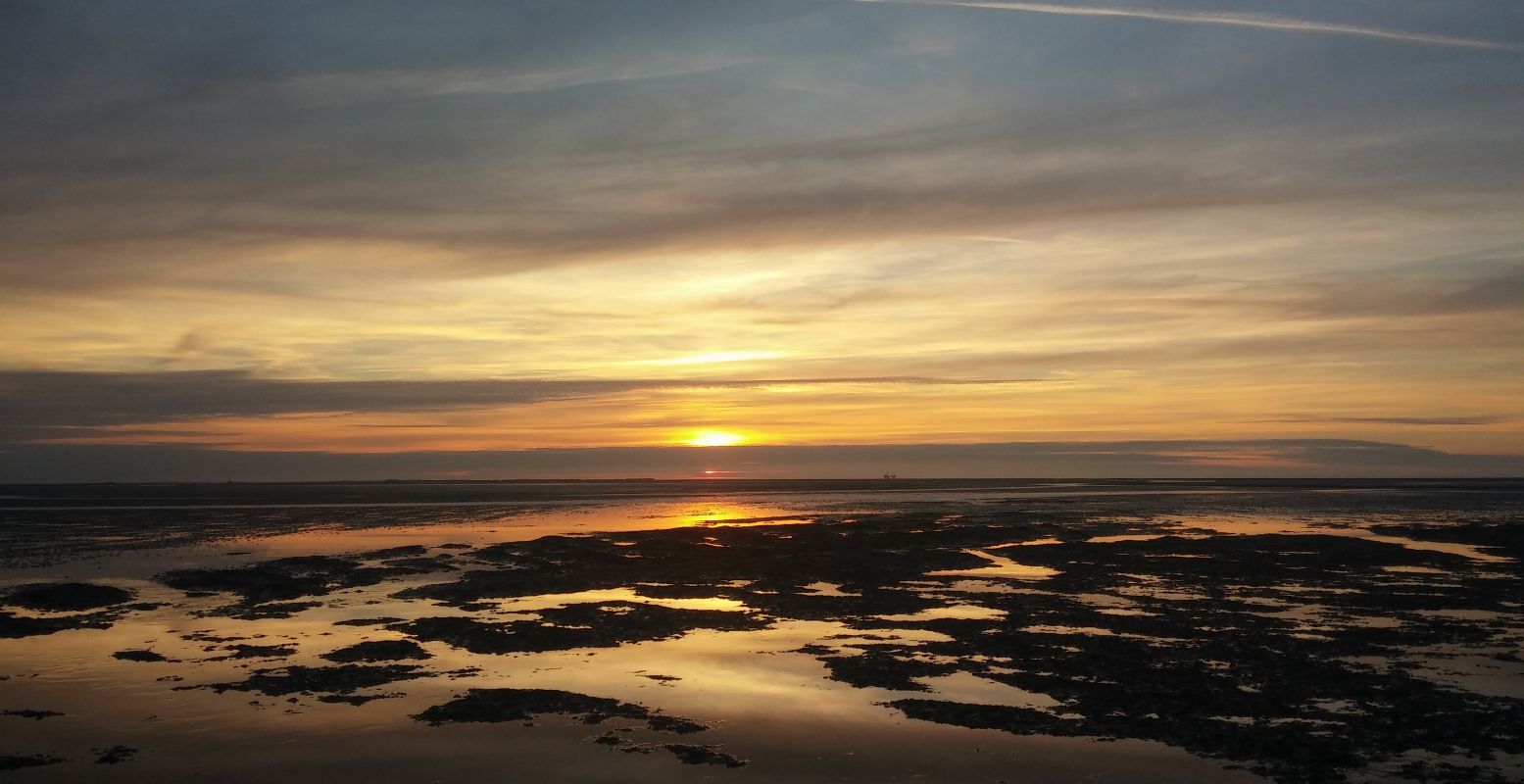 Prachtige zonsondergang over het Wad. Foto: DagjeWeg.NL © Mathilde van Ravensberg