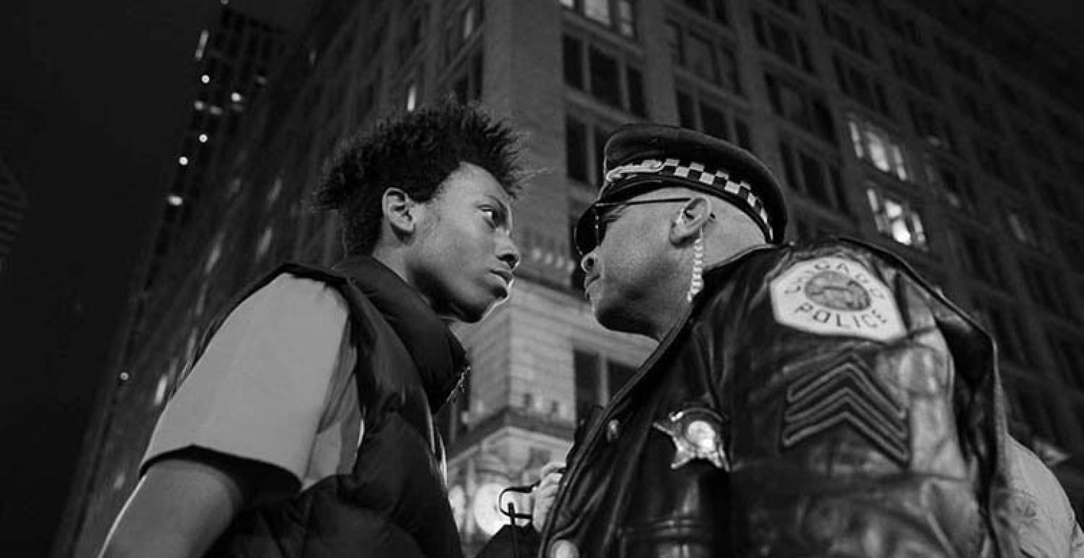 Contemporary Issues, 3rd prize singles. John J. Kim, USA, 2015, Chicago Tribune, March Against Police Violence. Lamon Reccord stares down a police sergeant during a protest following the fatal shooting of Laquan McDonald by police in Chicago, Illinois, USA, 25 November 2015.
