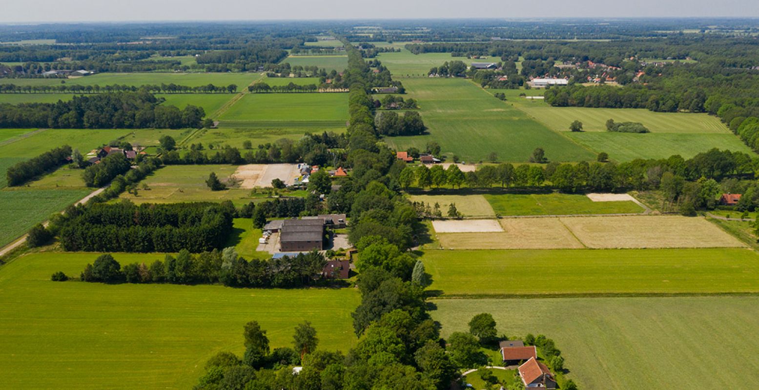 Luchtfoto van het kenmerkende strakke landschap van de koloniën, hier bij Wilhelminaoord. Foto: Koloniën van Weldadigheid © Miranda Drenth