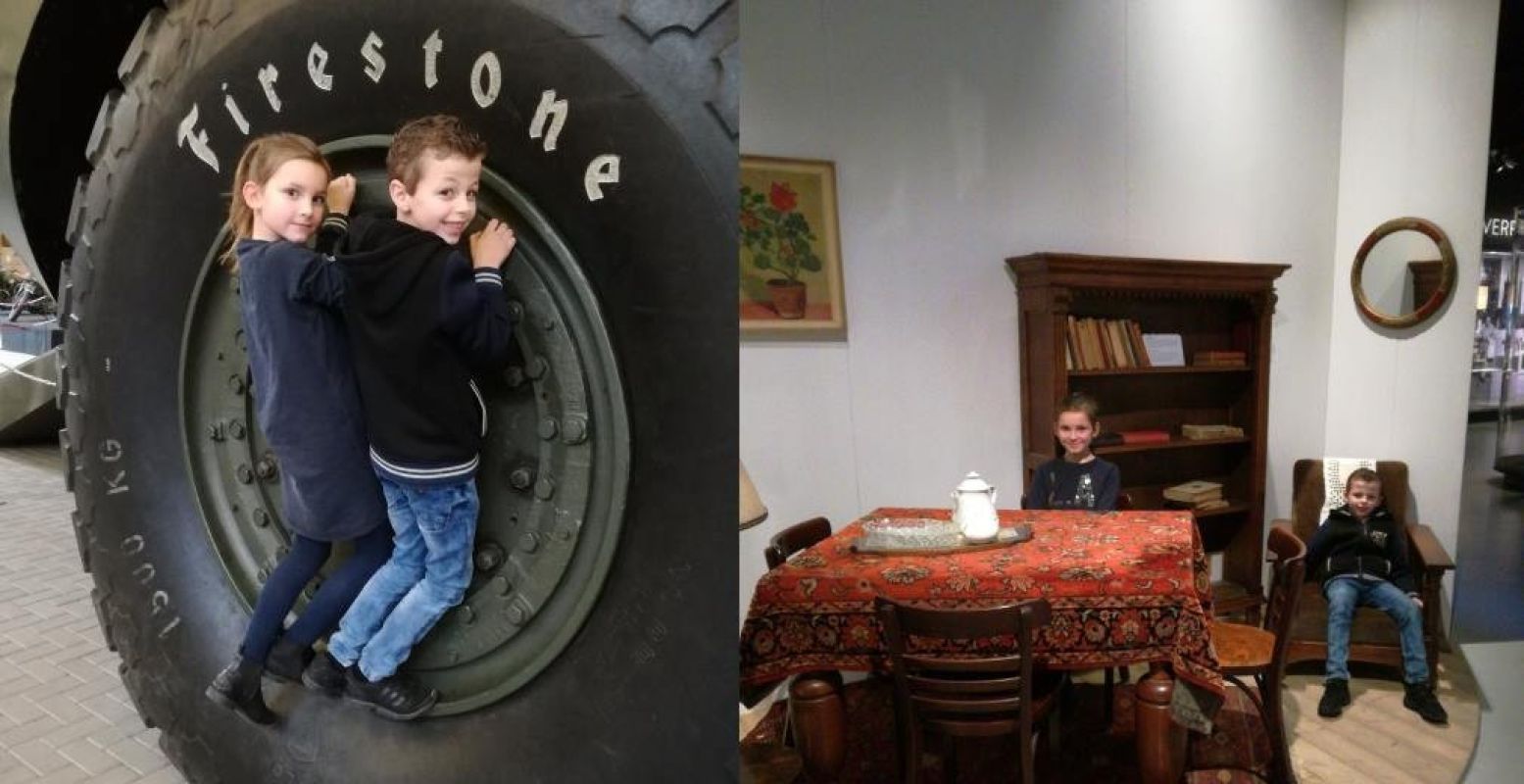 De gigantische wielen van een monsterlijk groot amfibievoertuig en een huiskamer uit grootmoeders tijd. Foto: Redactie DagjeWeg.NL.