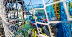 Op avontuur in een enorm nettenpark met spectaculaire tubebaan
