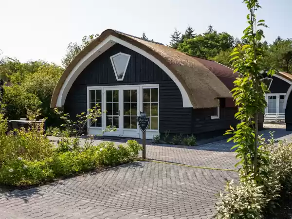 Slaap in een charmante cottage. Foto: 't Landgoed Baars