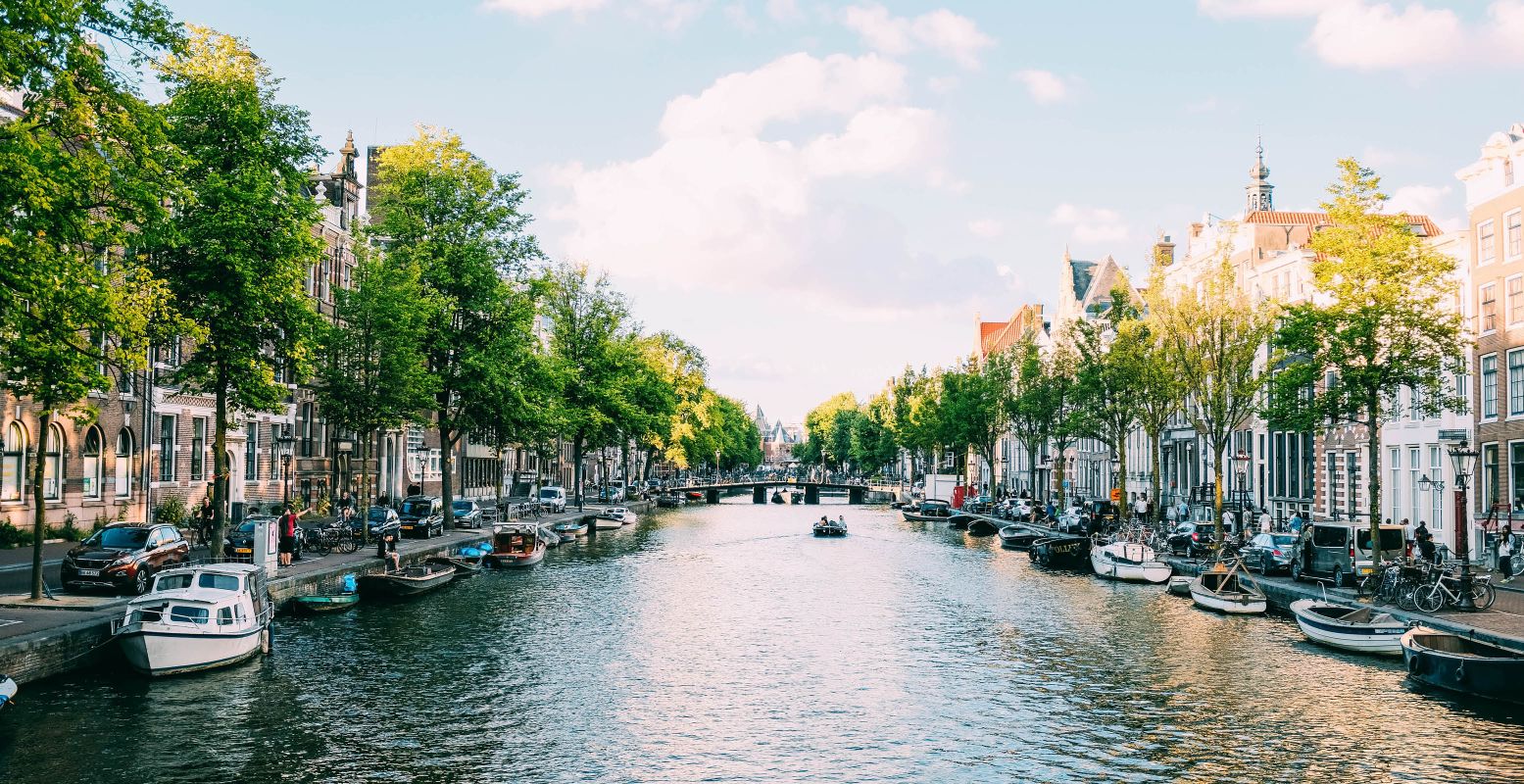 Ontdek Amsterdam door de ogen van een Amsterdammer. Foto:  Unsplash License  © Adrien Olichon