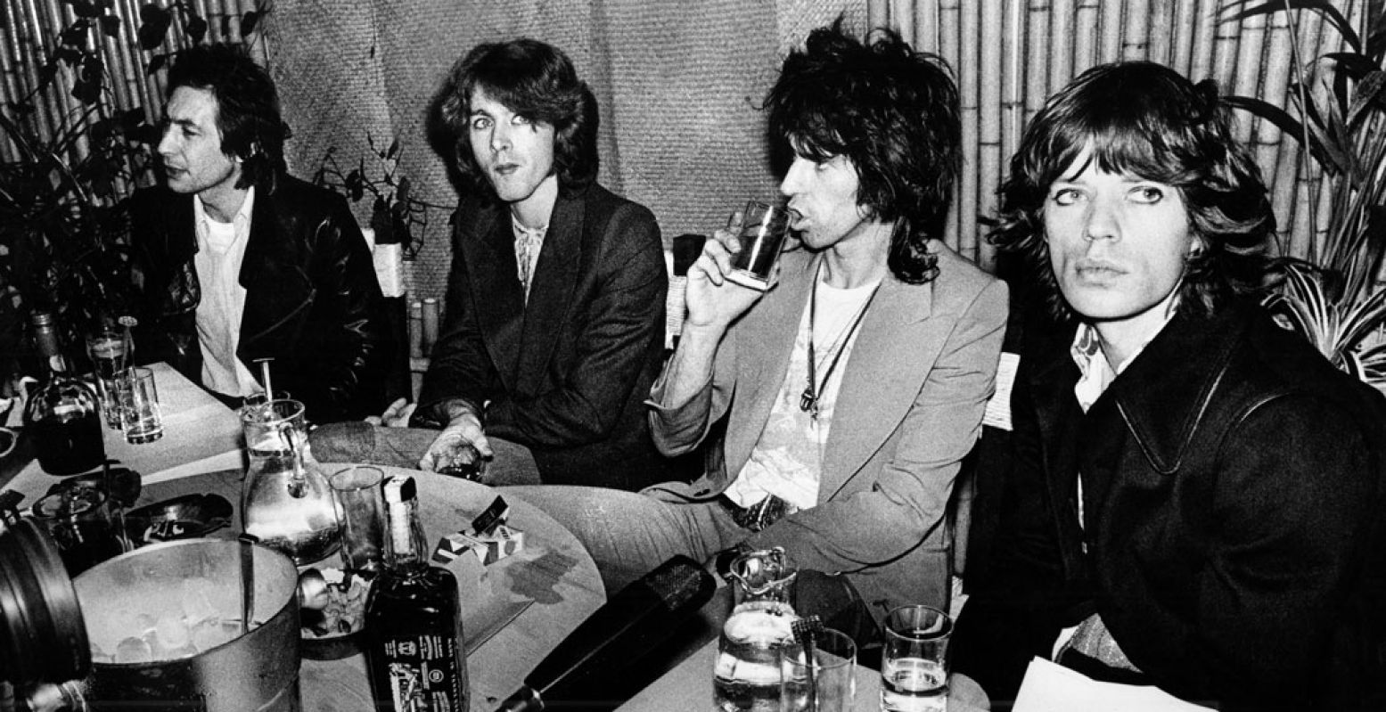 The Rolling Stones aan het diner. München, Duitsland 1973 Foto: © Gijsbert Hanekroot