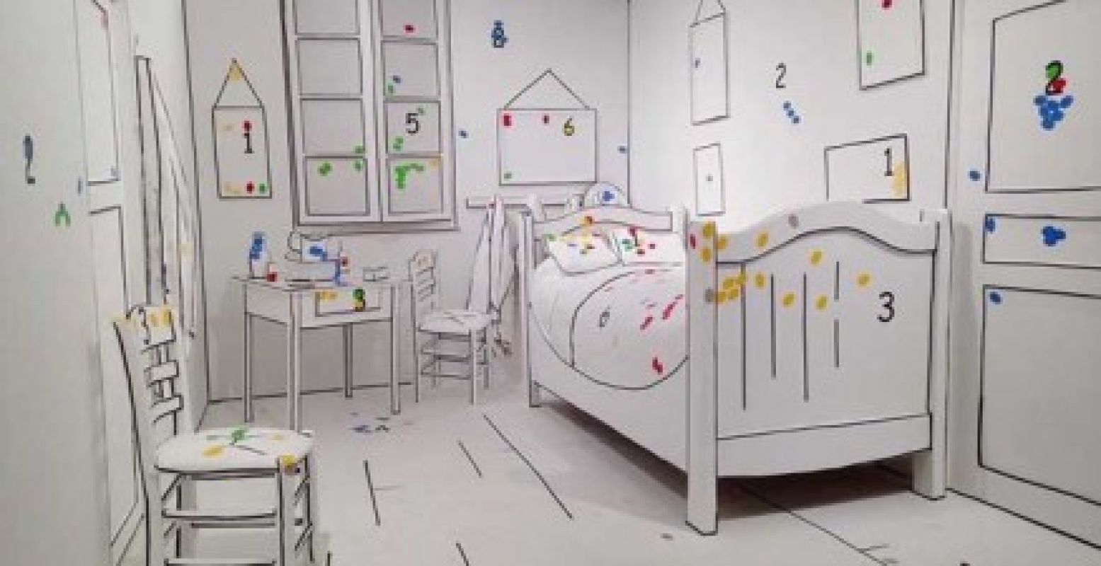 In het BAM is de slaapkamer van Van Gogh nagebouwd. Je mag zelf stickers kleurige stickers plakken om dit witte 'schilderij' in te kleuren. Foto: Museum voor Schone Kunsten