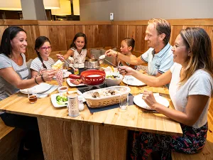 Eindig met après-ski of een traditionele fondue. Foto: SnowWorld © Meijs