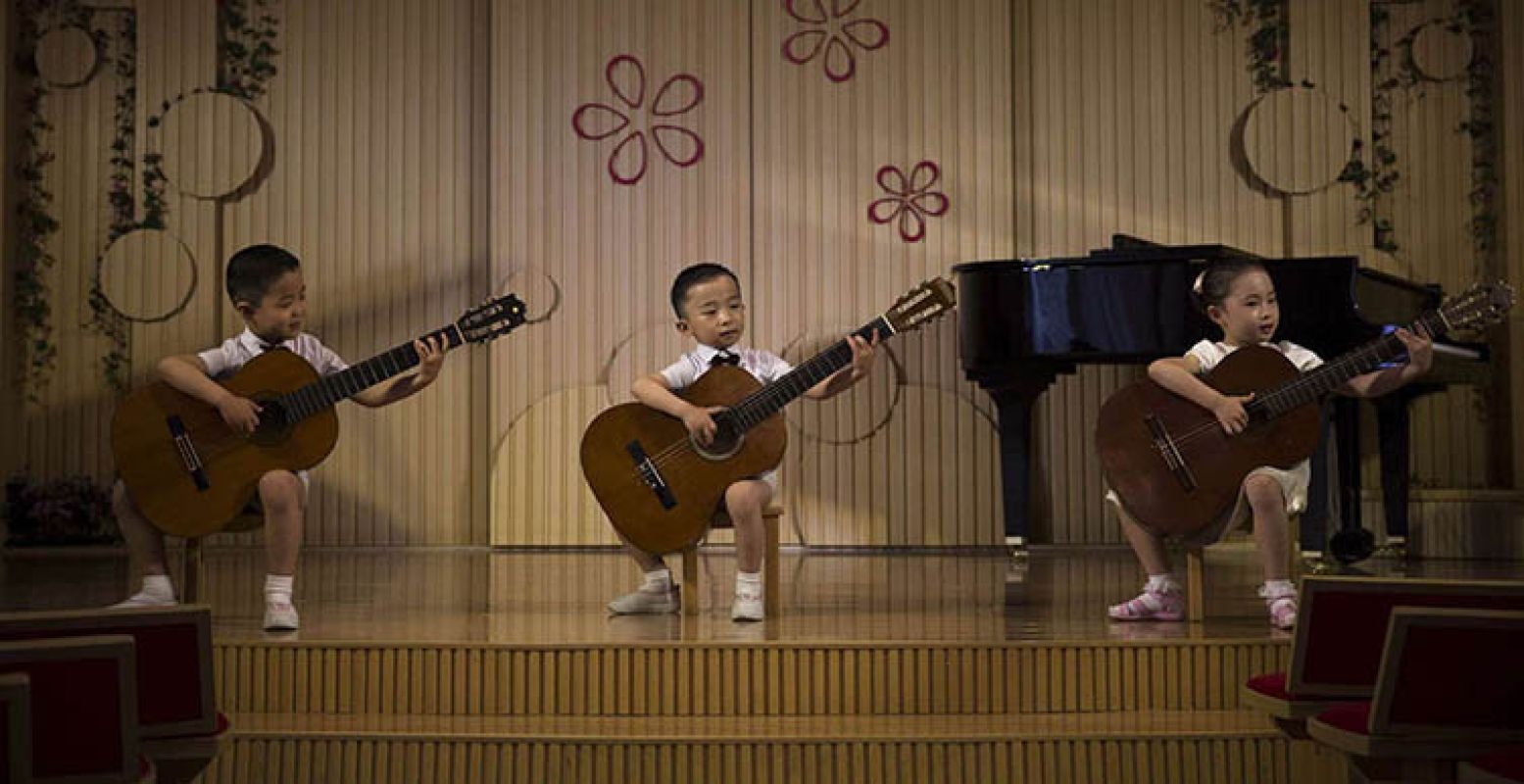 Long Term Projects, 3rd prize â€“ photo 5. David Guttenfelder, USA, 2015. Children perform at the Pyongyang Kyongsang Kindergarten in Pyongyang, North Korea, 20 May 2015.