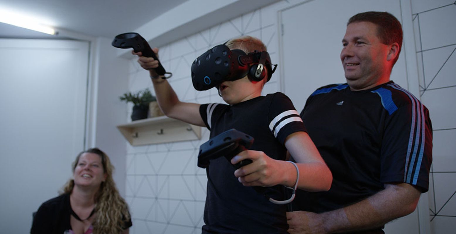Ga met het hele gezin op avontuur in een virtuele wereld. Foto: VR Adventure Den Bosch