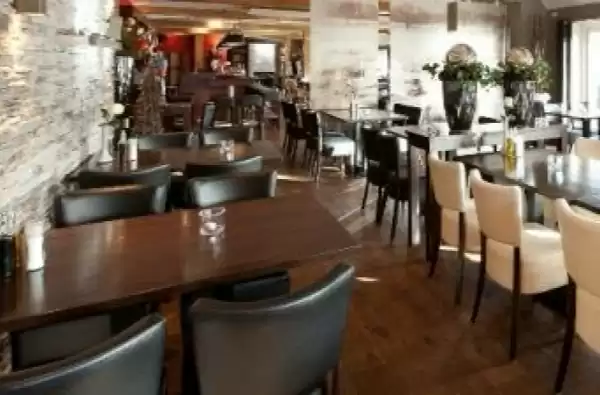 Schuif aan voor een diner. Foto: De Grachthof Schuif aan voor een diner. Foto: De Grachthof