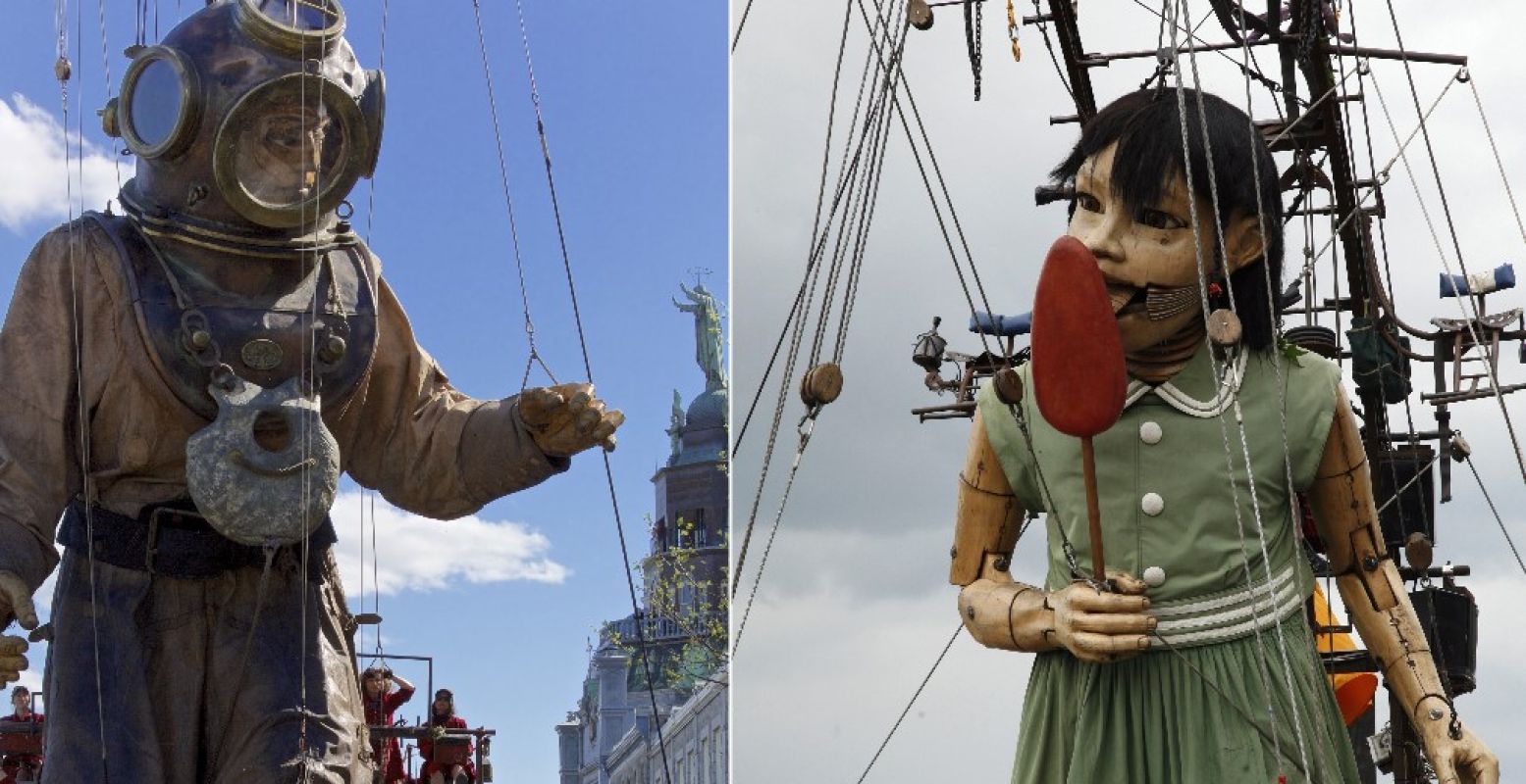 De Duiker, links, is 11 meter lang. Het Kleine Reuze Meisje is 5 meter lang. Foto: © Royal de Luxe _ Artcompress _ Pascal Victor